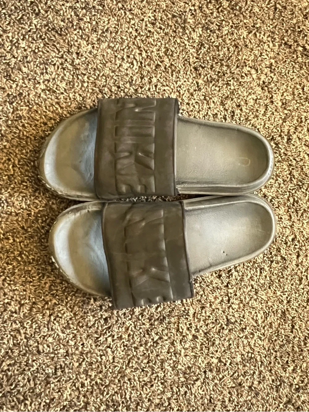 Nike Kids Black Slide Sandals with Embossed Strap